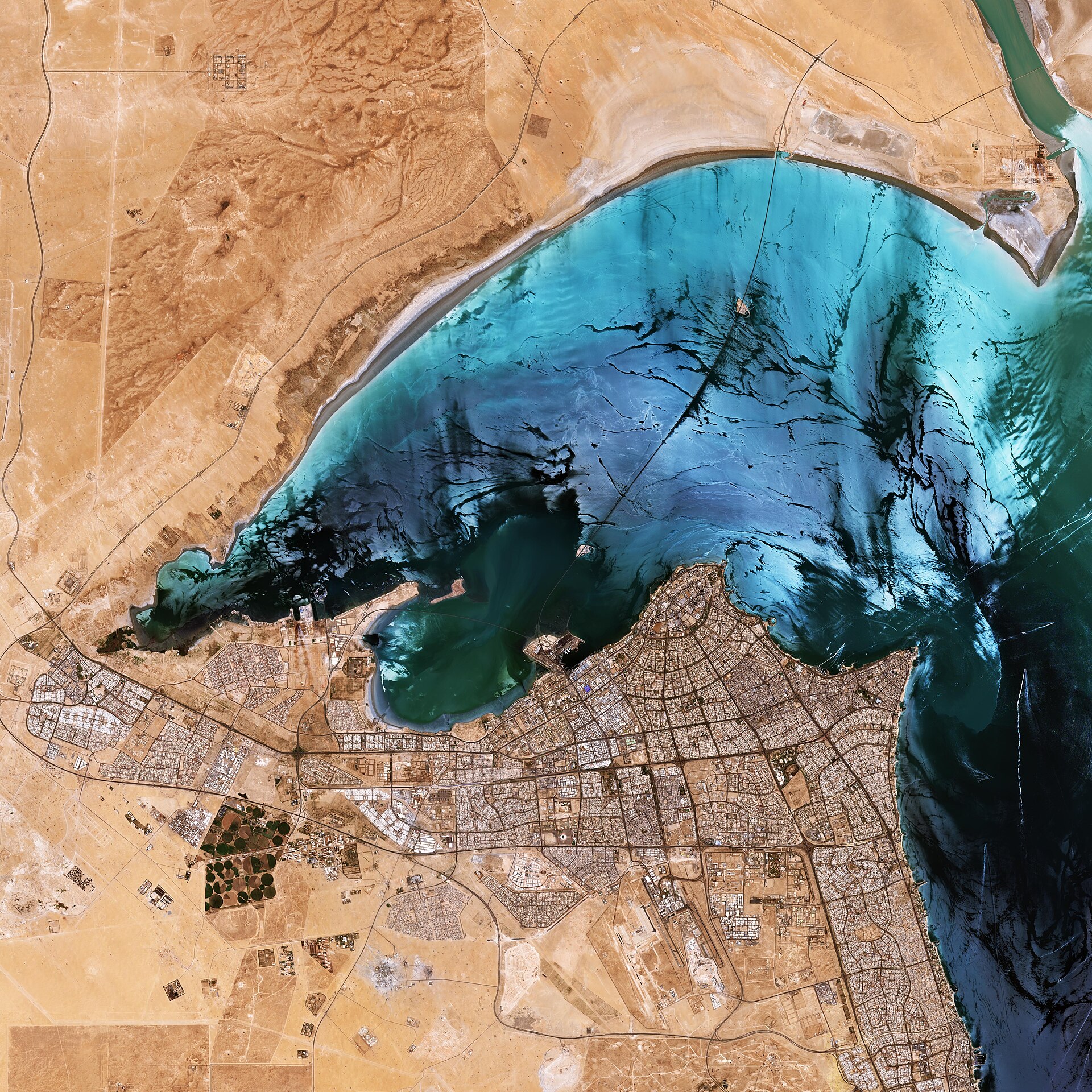 ESA satellite view of Kuwait City and Kuwait Bay, showing the Shuwaikh industrial district where Kuwait Petroleum Corporation headquarters is located