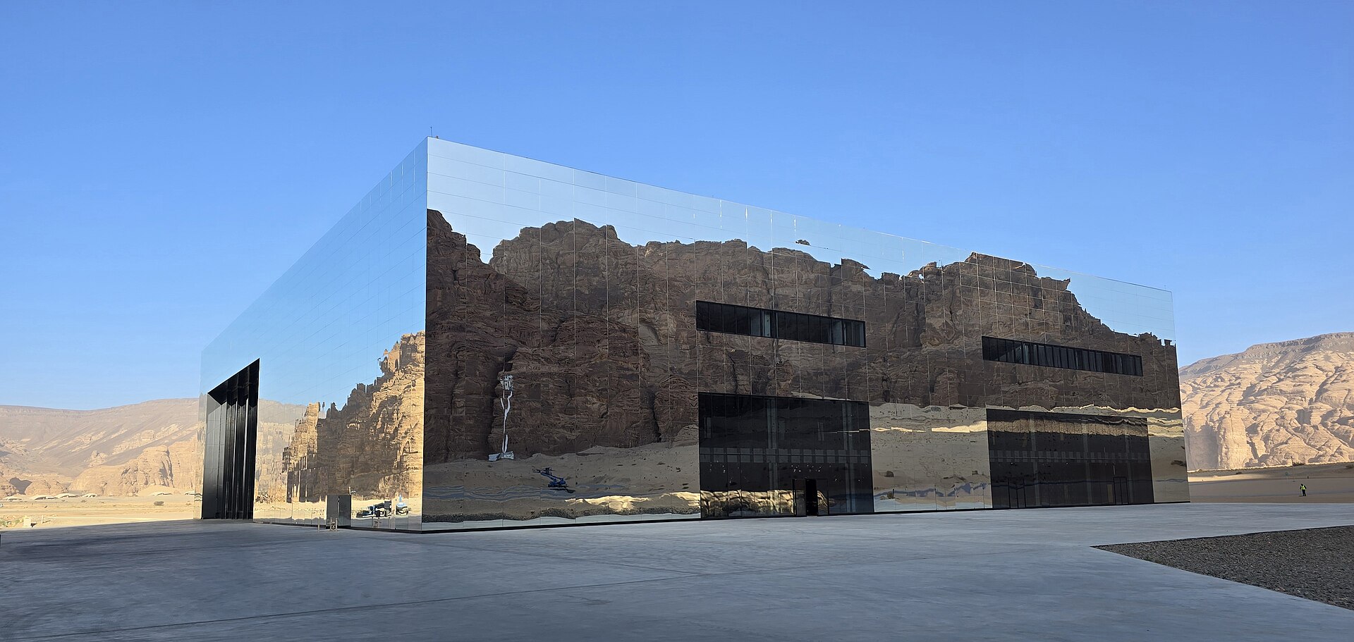 Maraya mirrored concert hall reflecting the surrounding sandstone canyon walls in AlUla