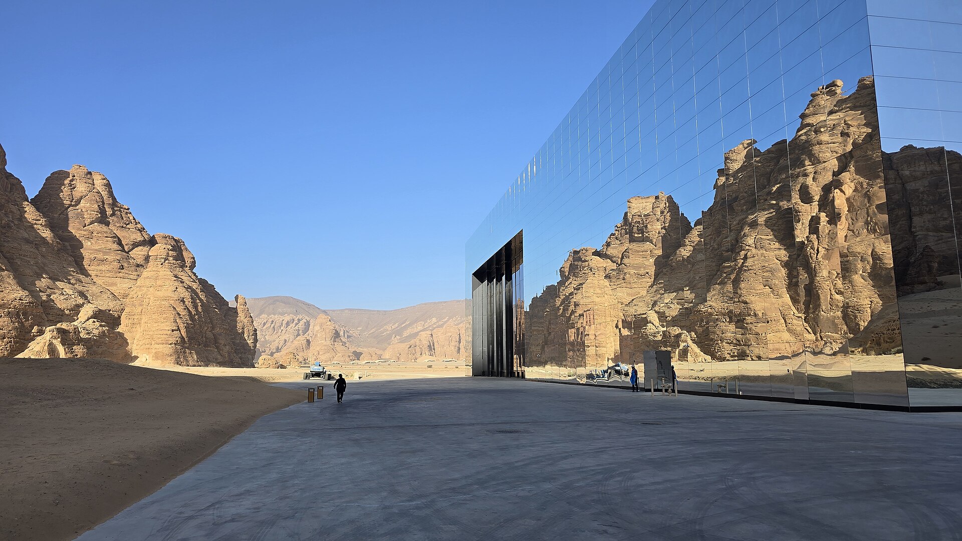 Maraya Concert Hall in AlUla, a massive mirrored building reflecting the desert rock formations