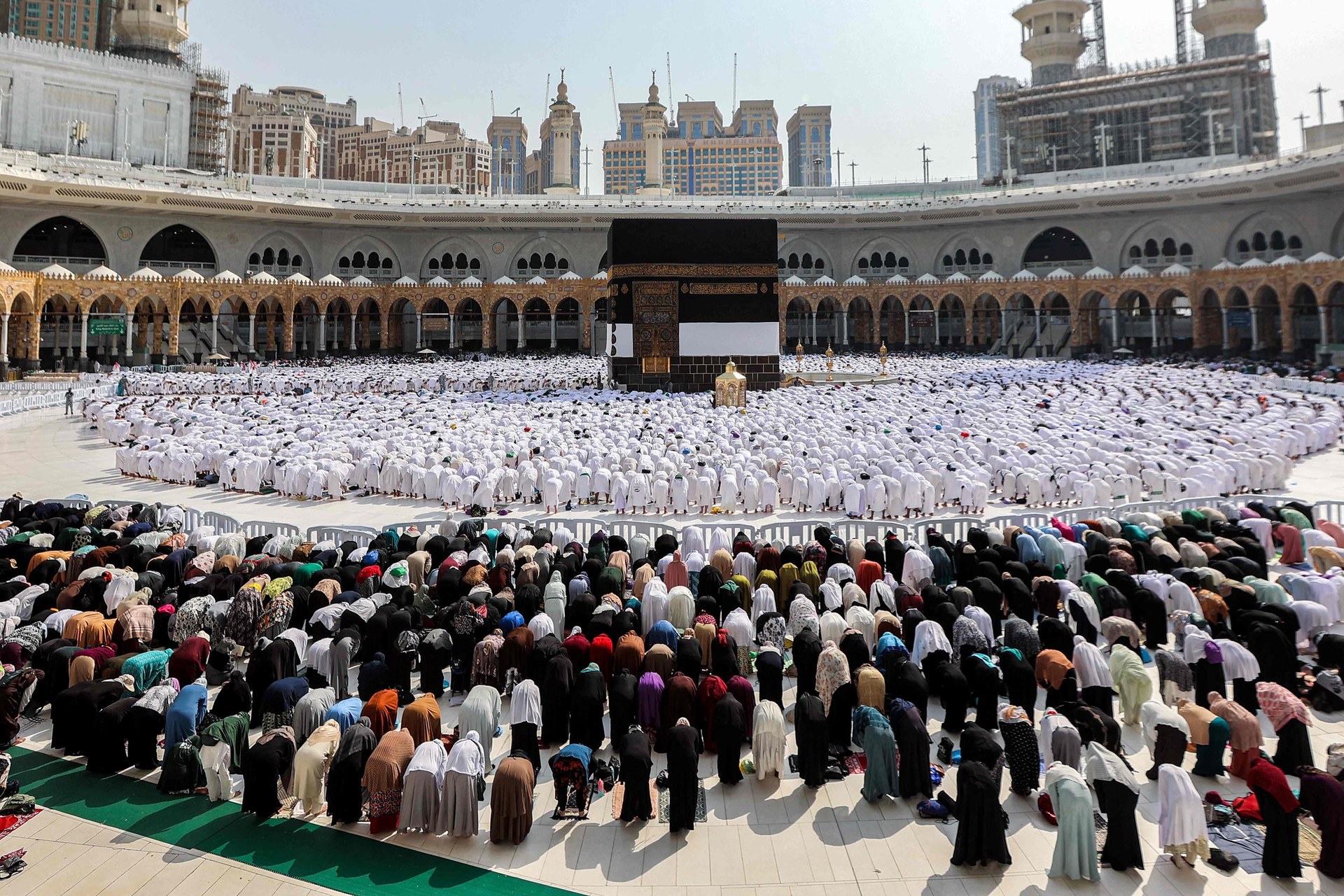 Pilgrims pray at Masjid al-Haram around the Kaaba in Mecca — Saudi Arabia is hosting 1.37 million foreign pilgrims for Hajj 2026 while under active missile threat