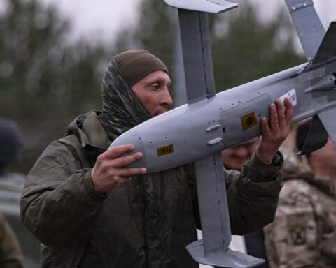 A Polish soldier moves a Merops Surveyor interceptor drone to its launch station during NATO counter-drone training at Lipa, Poland, November 2025. The US Army purchased 13,000 Merops drones for Gulf deployment within eight days of the Iran conflict starting.