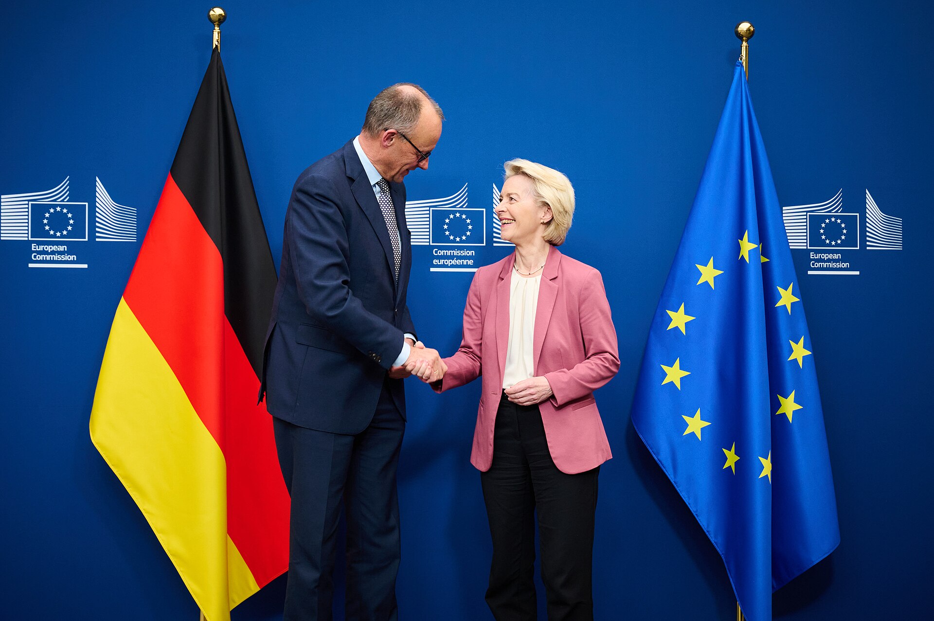 German Chancellor Friedrich Merz shakes hands with European Commission President Ursula von der Leyen at the European Commission headquarters, December 2025
