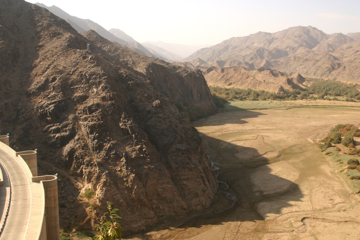 The Najran Valley Dam with dramatic mountain gorge and wadi stretching into the distance