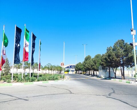 The entrance road of the Natanz nuclear enrichment complex in Iran, flying Iranian flags, photographed in 2022