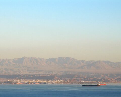 Gulf of Aqaba coastline near Haql, northwest Saudi Arabia — the landscape that frames the NEOM construction zone in Tabuk Province