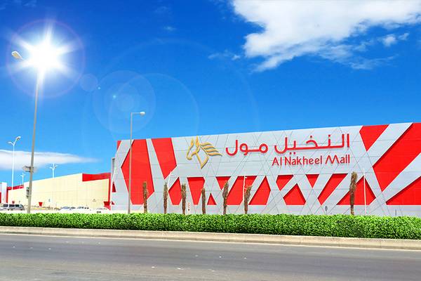 Al Nakheel Mall exterior in north Riyadh with distinctive red and white facade