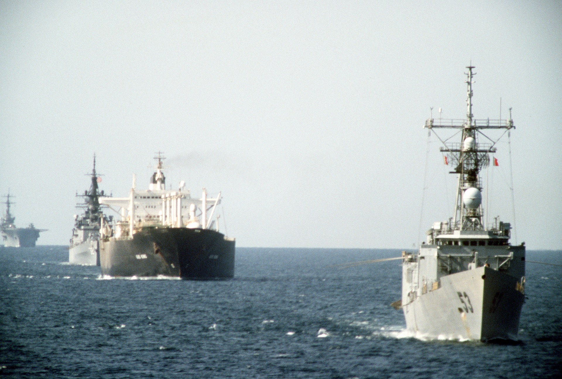 US Navy frigates escort reflagged Kuwaiti oil tanker Gas King through the Persian Gulf during Operation Earnest Will, October 1987