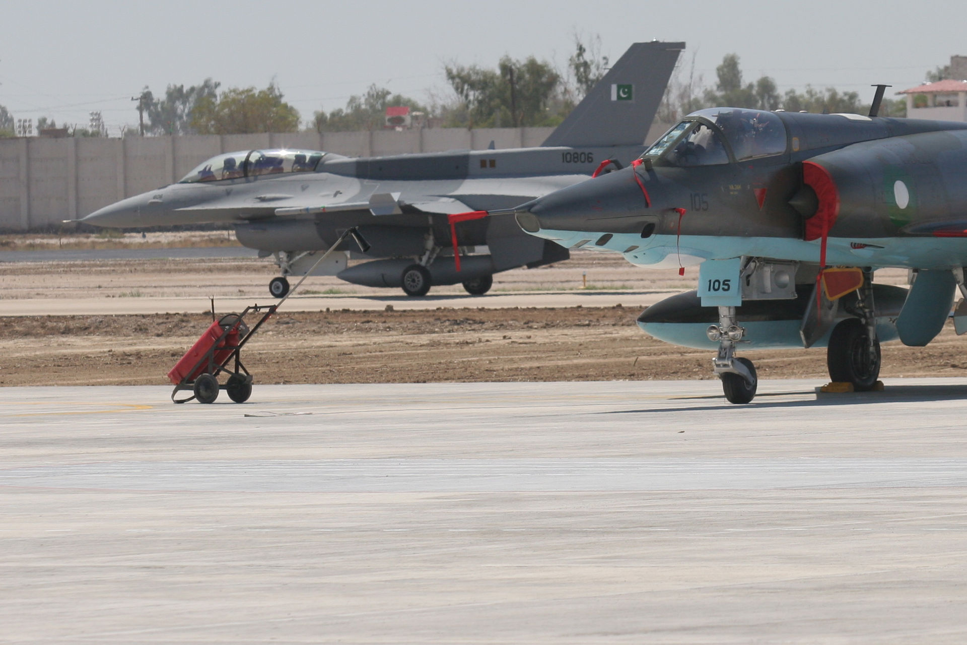 Pakistan Air Force F-16C Block 52+ and Mirage fighter jets on the tarmac at PAF Base Shahbaz, Jacobabad, Pakistan