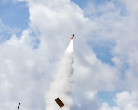 PAC-3 Patriot interceptor missile launches with smoke trail during live-fire exercise — air defense intercept imagery
