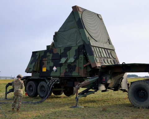 US Army soldier conducts final checks on AN/MPQ-53/65 Patriot radar array before activation, Misawa Air Base, Japan, October 2024