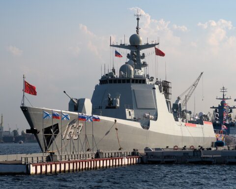 PLANS Jiaozuo (DDG-163), a Chinese People’s Liberation Army Navy Type 052D guided-missile destroyer, moored during a port visit, flying the Chinese naval flag