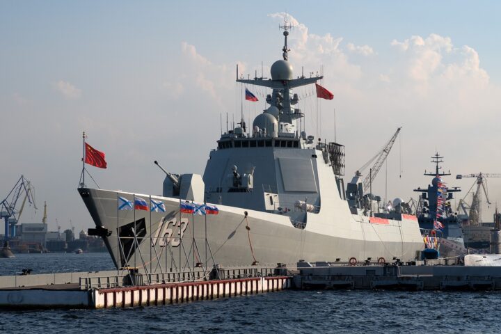 PLANS Jiaozuo (DDG-163), a Chinese People’s Liberation Army Navy Type 052D guided-missile destroyer, moored during a port visit, flying the Chinese naval flag