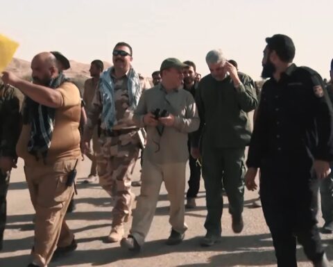 Popular Mobilization Forces fighters with Iranian Revolutionary Guard advisor during Hawija offensive, Iraq 2017