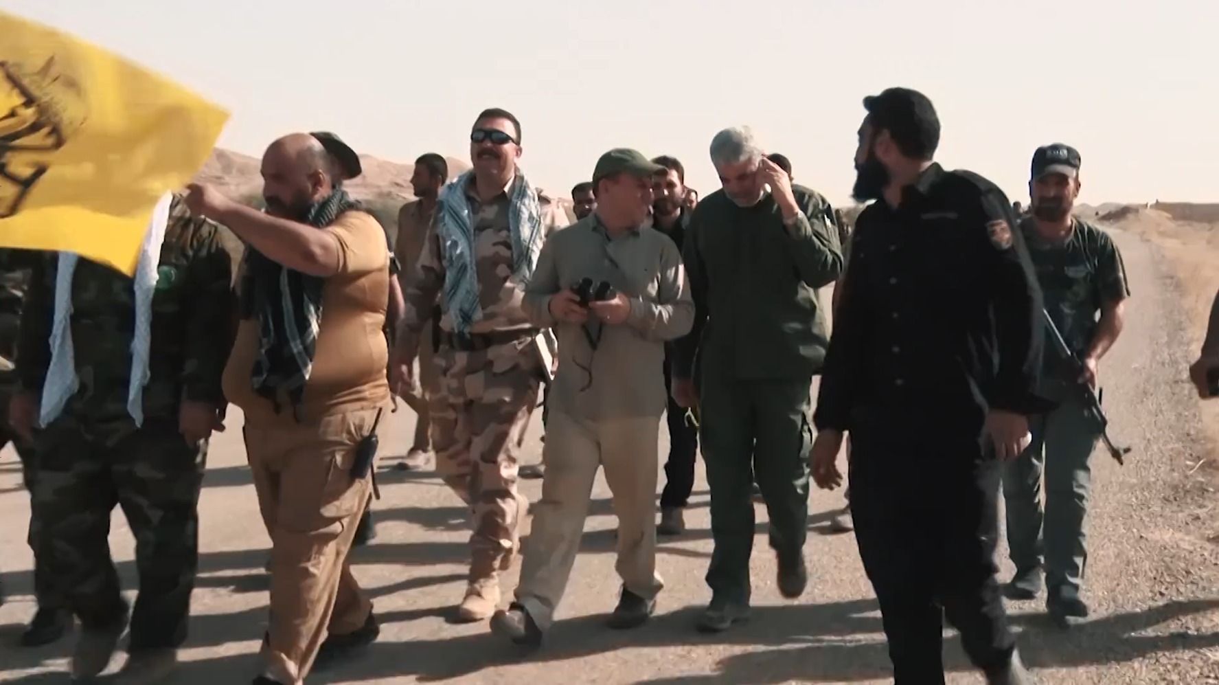 Popular Mobilization Forces fighters with Iranian Revolutionary Guard advisor during Hawija offensive, Iraq 2017