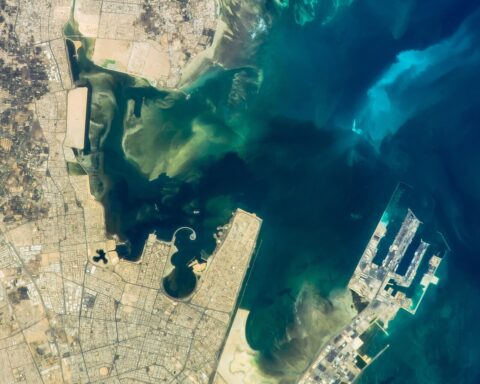 Ras Tanura oil loading terminal and offshore sea-island facilities, Saudi Arabia, photographed from the International Space Station. Aramco's Eastern Province terminals handled 80 percent of Saudi crude exports before the Hormuz blockade.