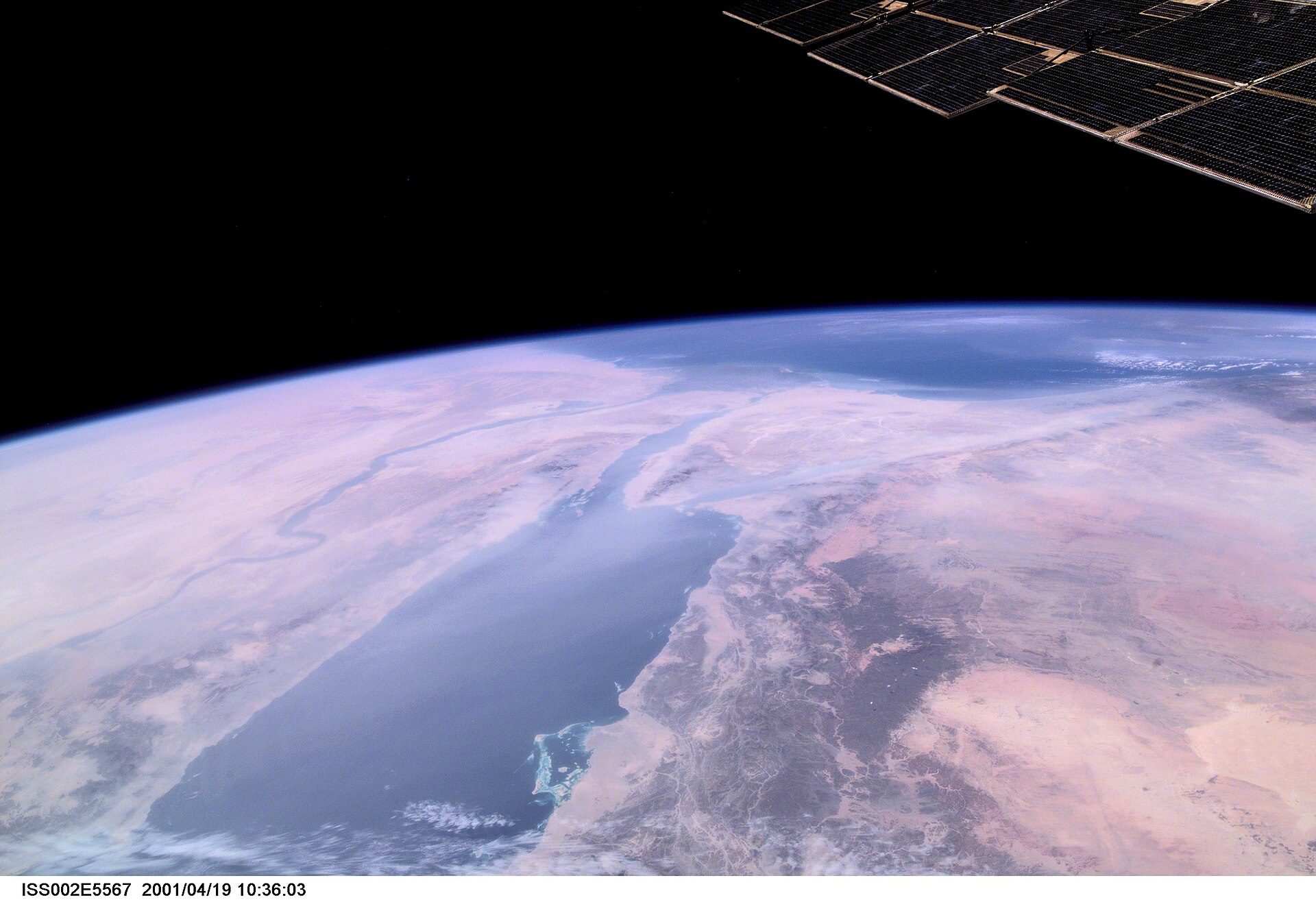NASA ISS view of the Red Sea corridor from space, showing Saudi Arabia on the east coast and Sudan and Egypt on the west — the 1,900km waterway at the centre of Saudi Arabia's wartime logistics architecture