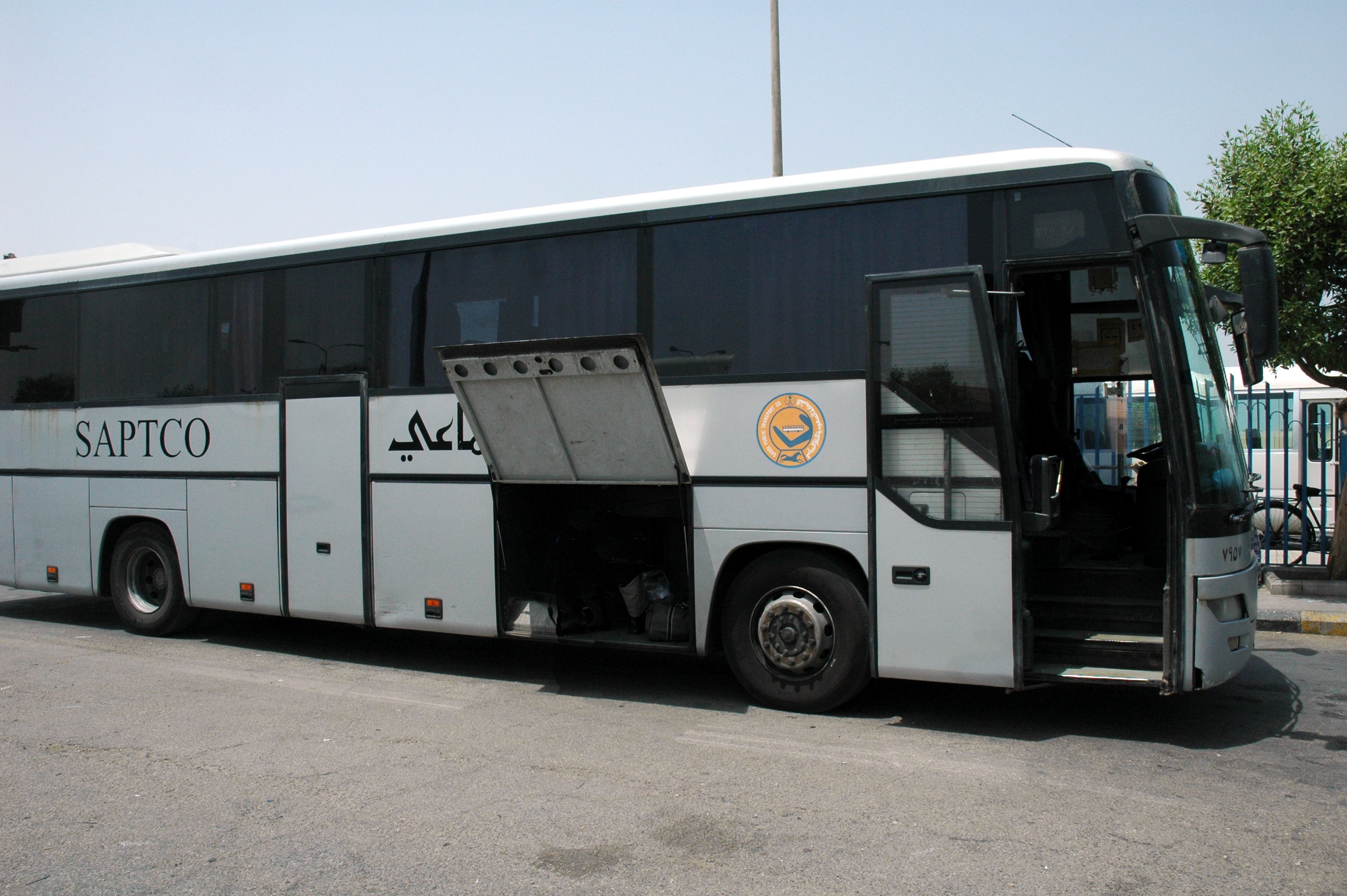 A white SAPTCO intercity bus in Saudi Arabia