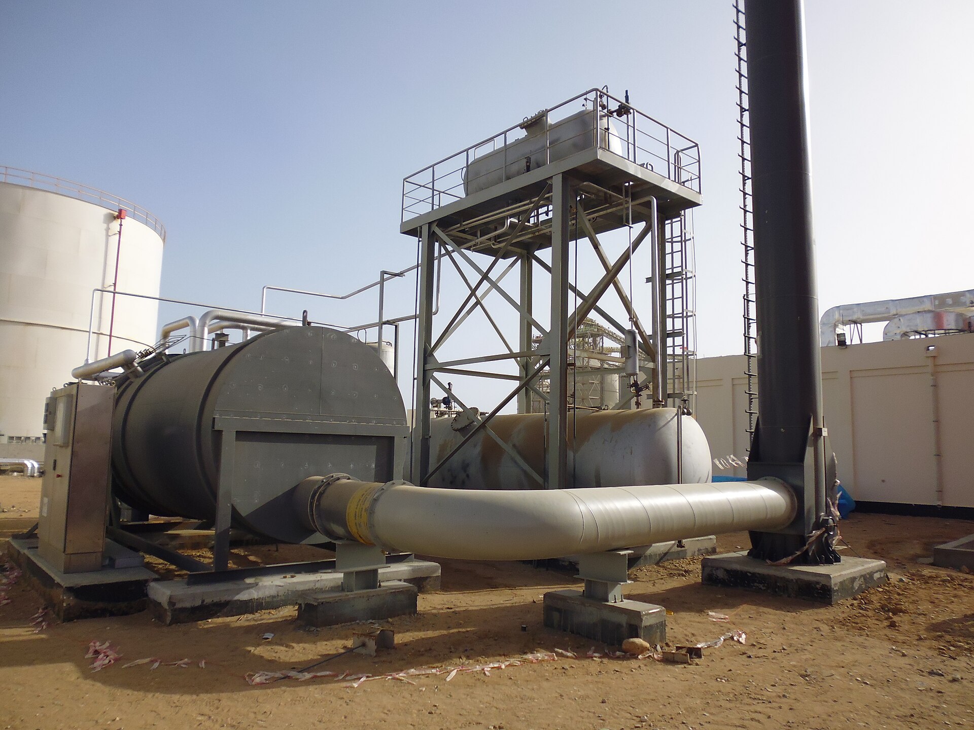 Fired heater and process piping at a Saudi Arabia petrochemical facility — the type of equipment requiring engineering assessment and parts procurement before restart after physical damage