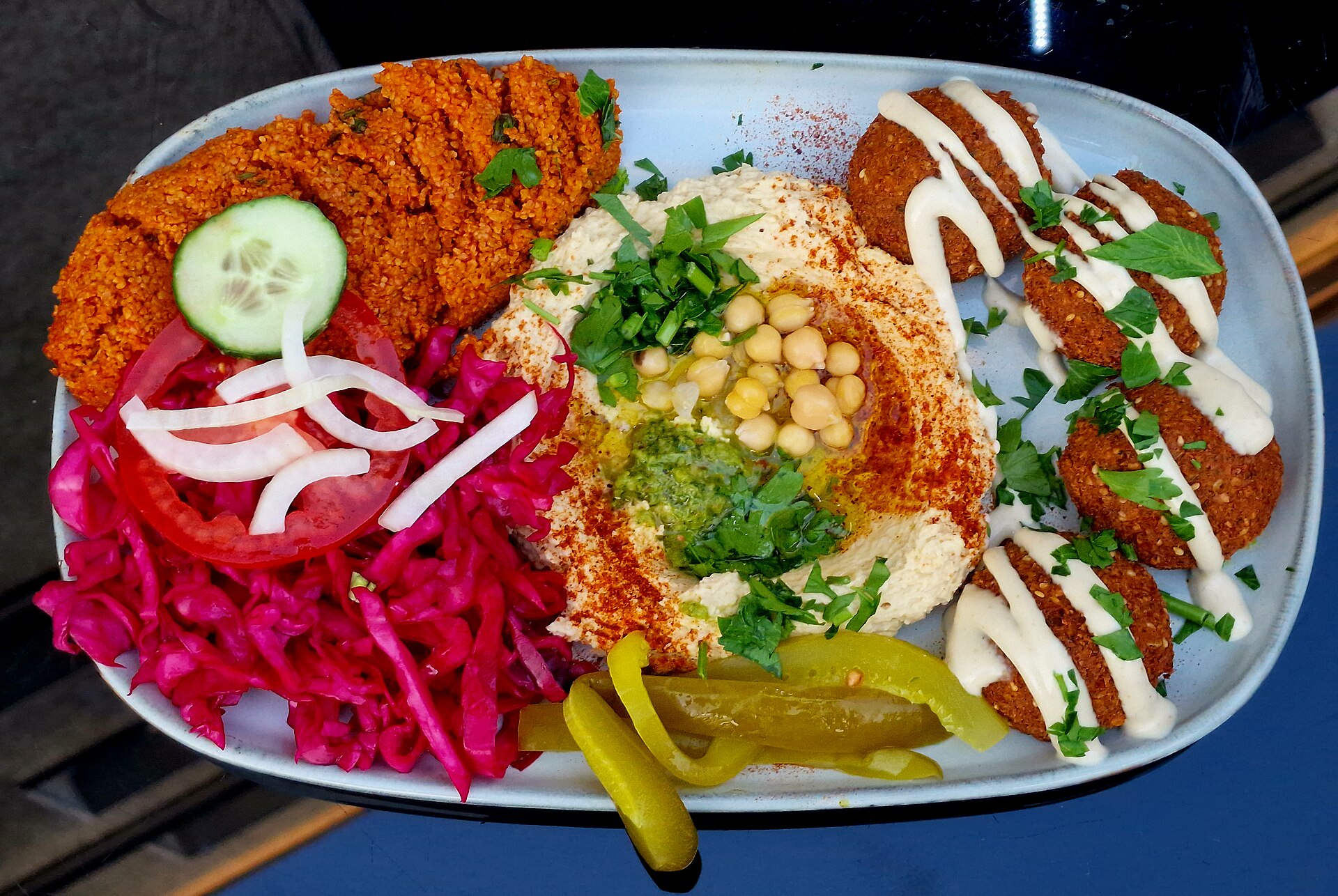 Fresh dates and Arabic bread at a Saudi market stall