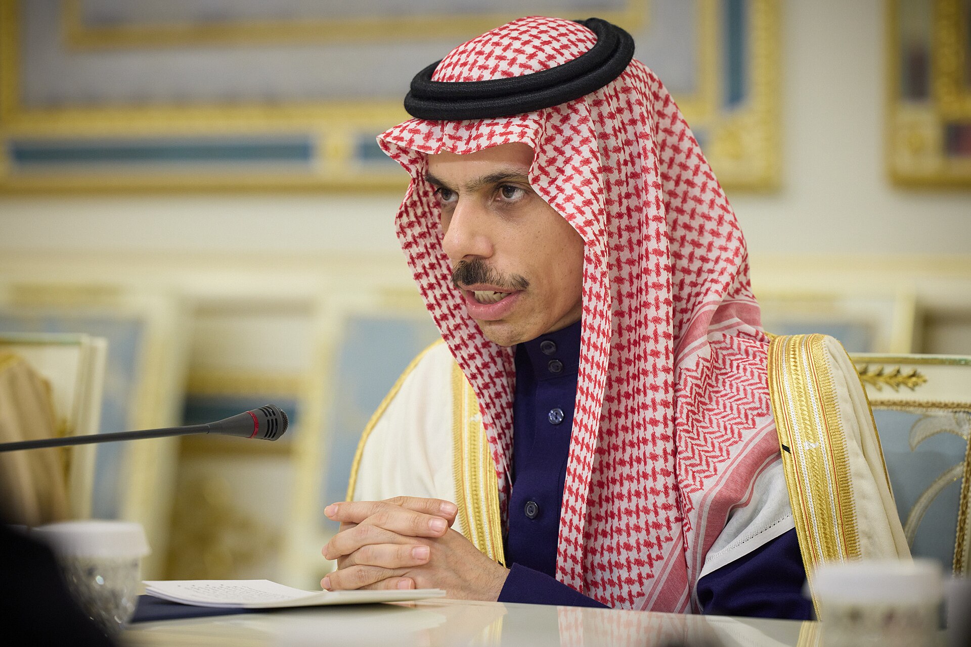 Saudi Foreign Minister Faisal bin Farhan at diplomatic meeting table
