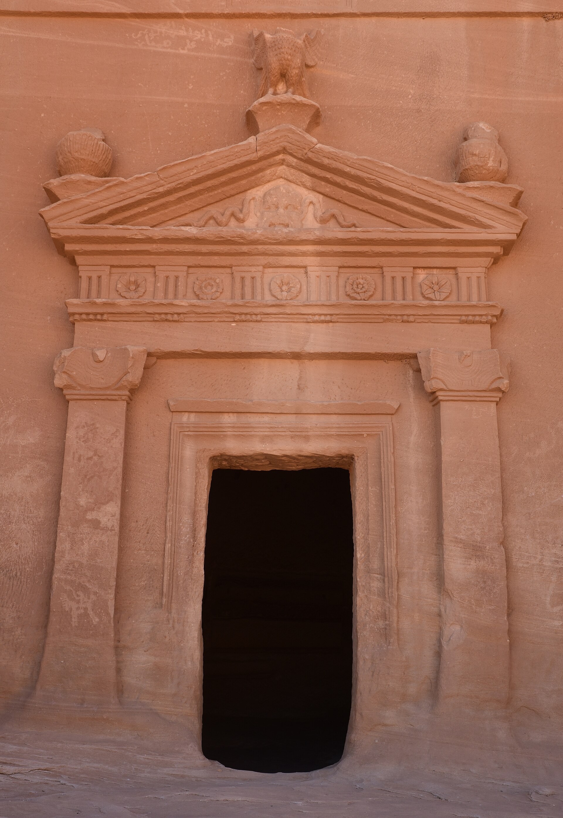 Carved Nabataean tomb facade at Hegra UNESCO World Heritage Site in AlUla Saudi Arabia