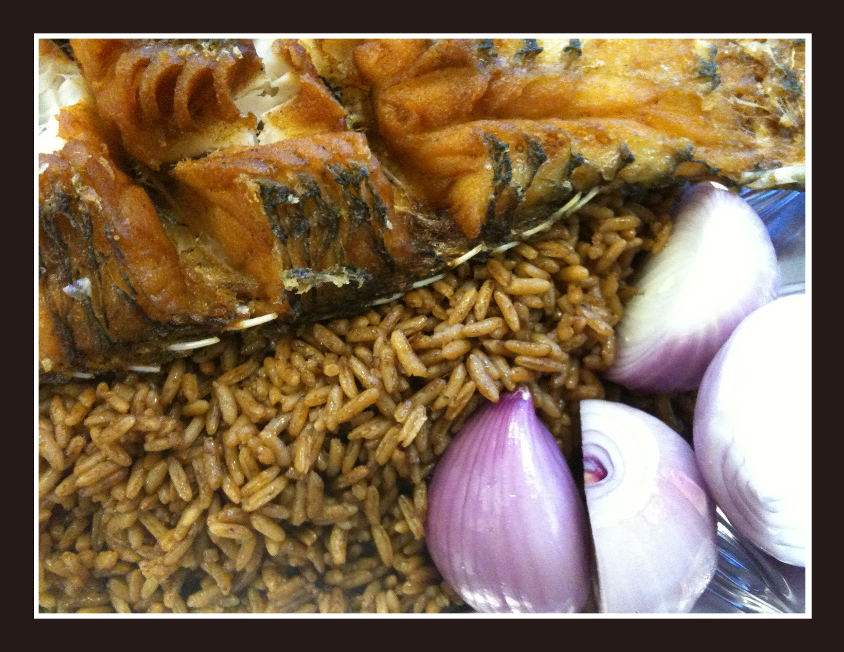 Traditional Saudi Arabian restaurant food served with rice and fresh accompaniments