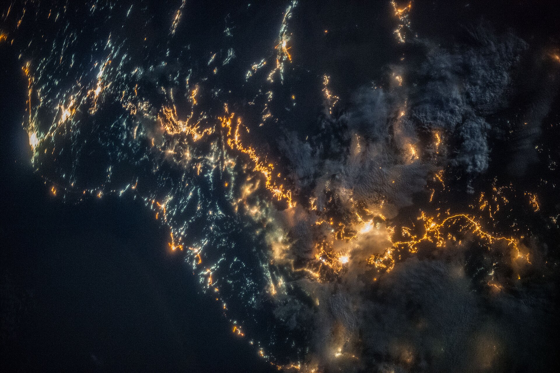 ISS nighttime photograph of southwestern Saudi Arabia showing city lights along the Asir mountain corridor near Khamis Mushait and the Jizan coast