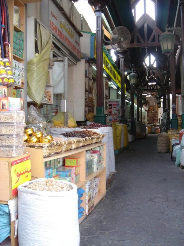 Spice market stall in Jeddah with colourful mounds of cumin, turmeric, cardamom and dried chillies