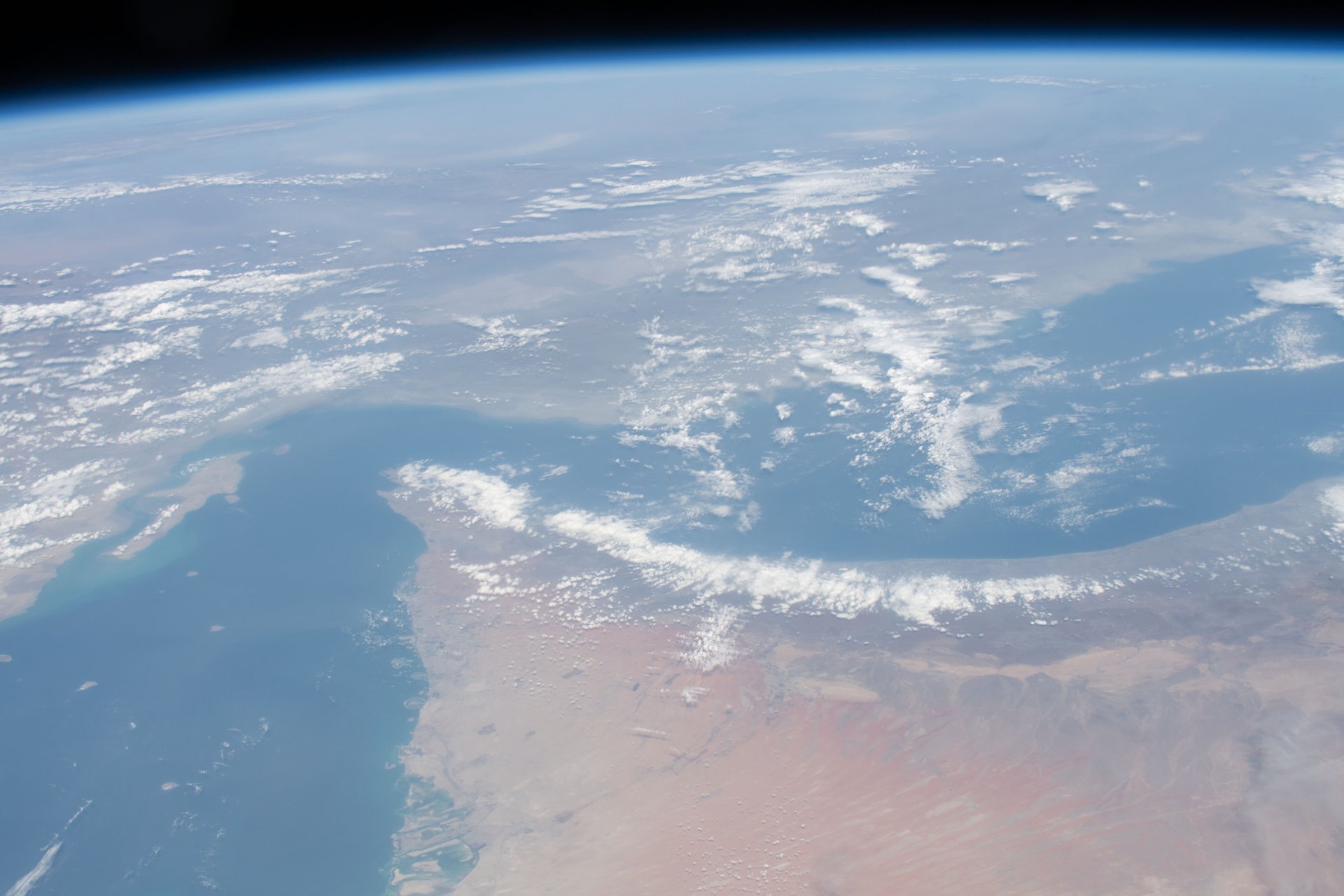 Strait of Hormuz photographed from the International Space Station during Expedition 62, showing the Gulf waterway between Iran and the Arabian Peninsula through which 20 million barrels of oil transit daily