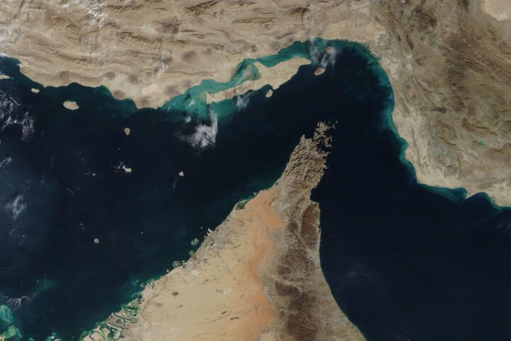 NASA MODIS satellite image of the Strait of Hormuz showing Qeshm Island and the narrow Larak corridor, December 2020