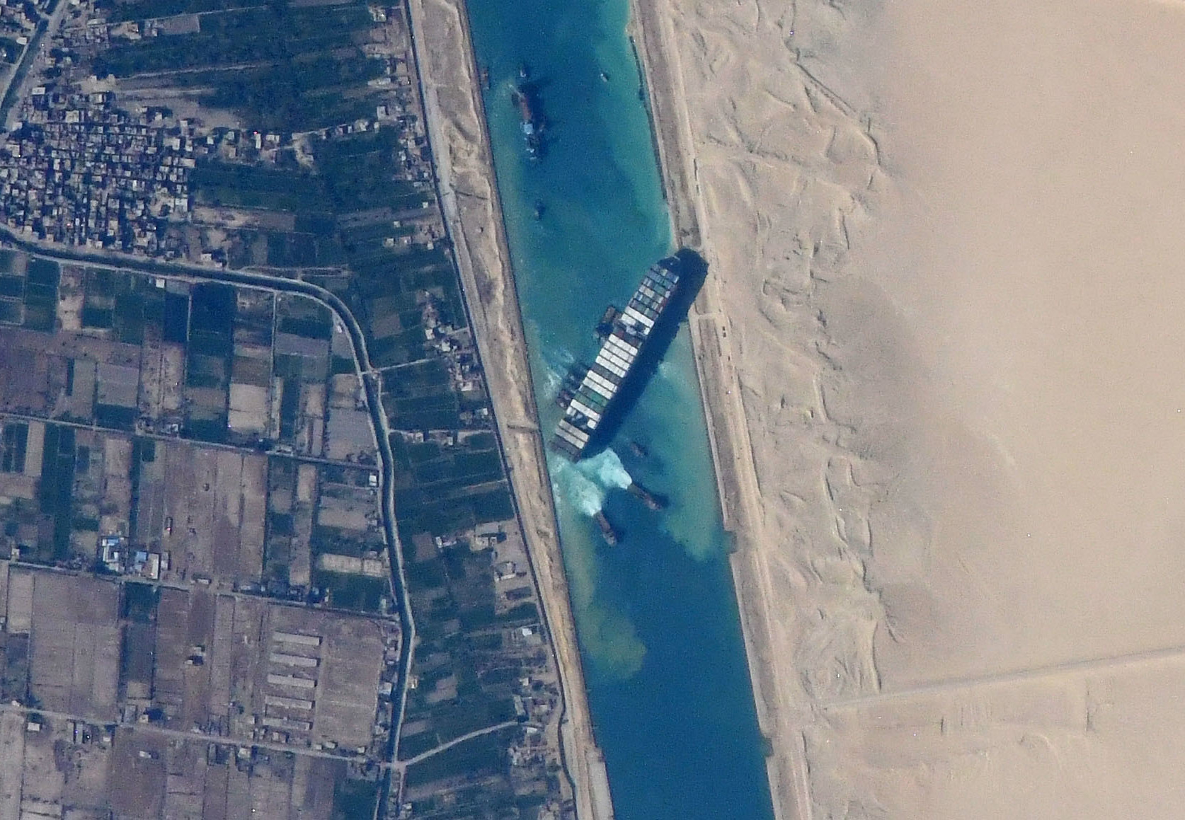 The Suez Canal photographed from the International Space Station during the Ever Given grounding, March 2021 — Egypt controls the only major alternative route for Gulf crude heading to Europe
