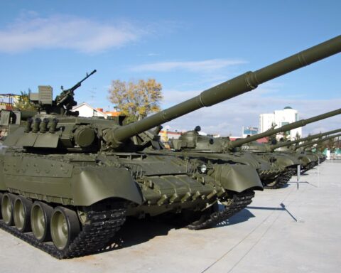 T-80UD main battle tanks in military green at Verkhnyaya Pyshma museum, Russia — the same platform Pakistan operates in its 25th Mechanised Division