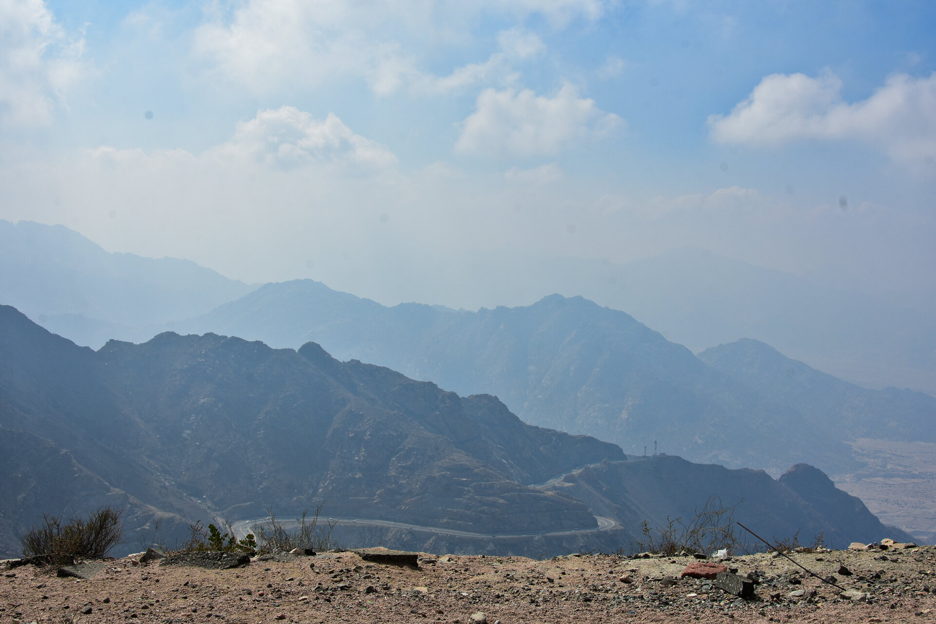 Panoramic view from the Al Hada summit looking across the layered ridges of the Sarawat Mountains near Taif
