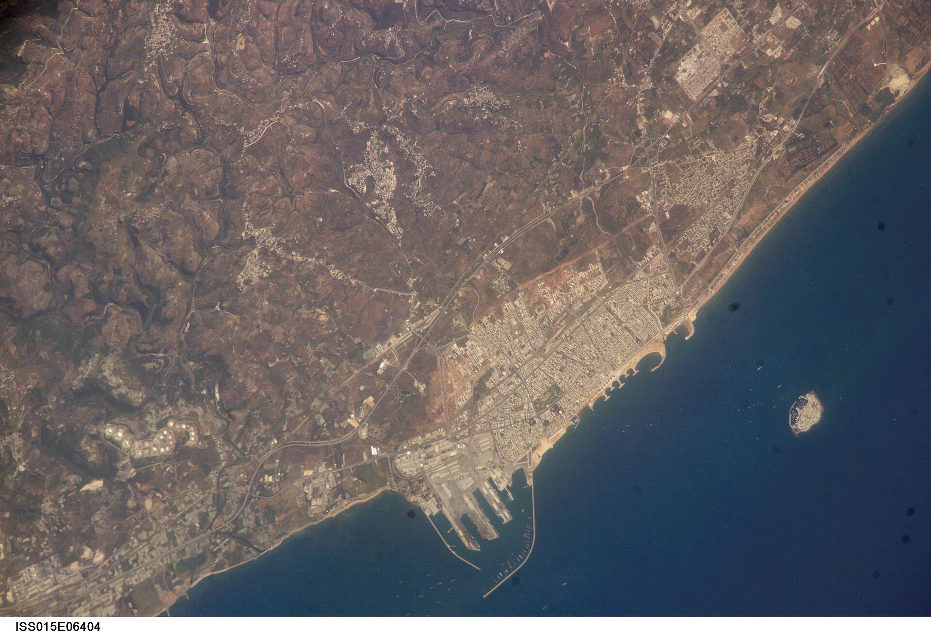 Tartus port and city on Syria's Mediterranean coast from the International Space Station — the UAE has committed $800 million to develop the port as a logistics hub