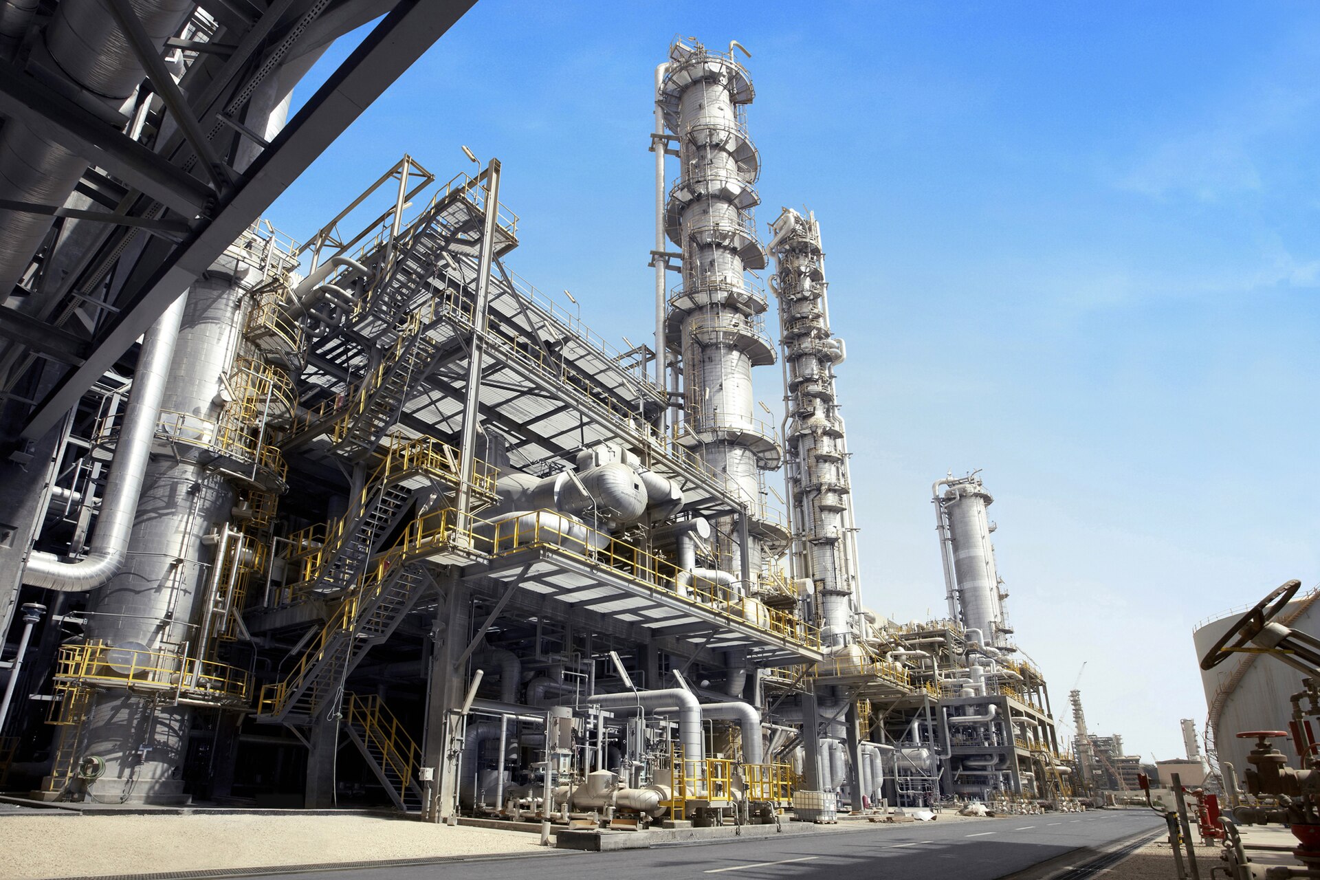 Distillation columns and process towers at a TASNEE petrochemical facility in Jubail Industrial City, Saudi Arabia — one of the largest integrated chemical complexes in the world