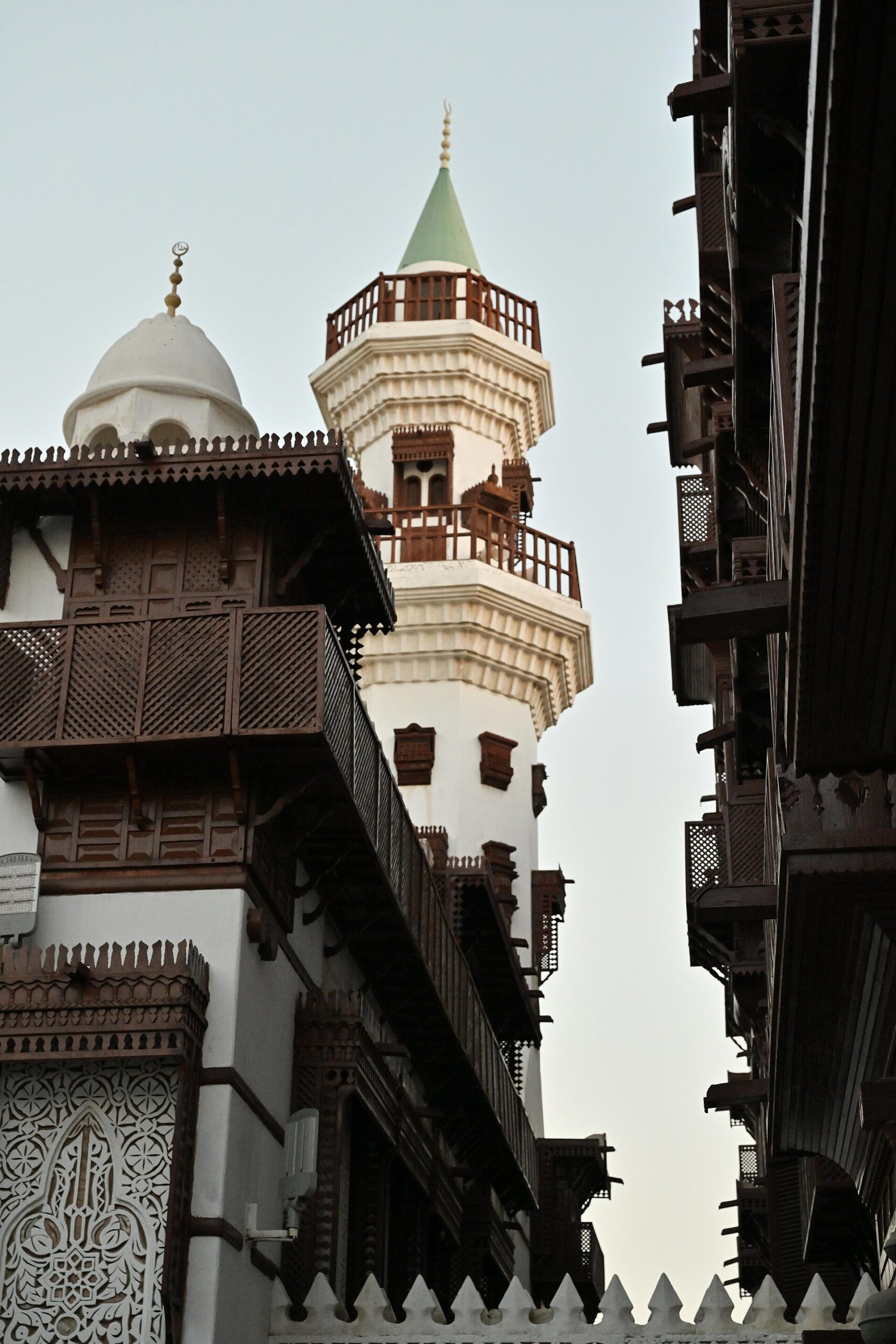 Tayebat City Museum in Jeddah showing traditional Hejazi architecture with ornate wooden balconies and a minaret