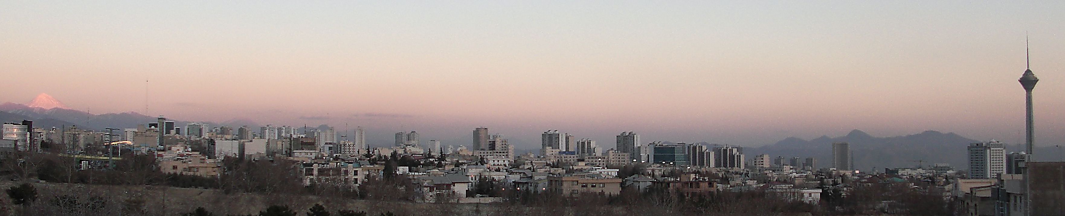 Tehran skyline panorama showing the Milad Tower and Alborz mountain range, Iran capital city
