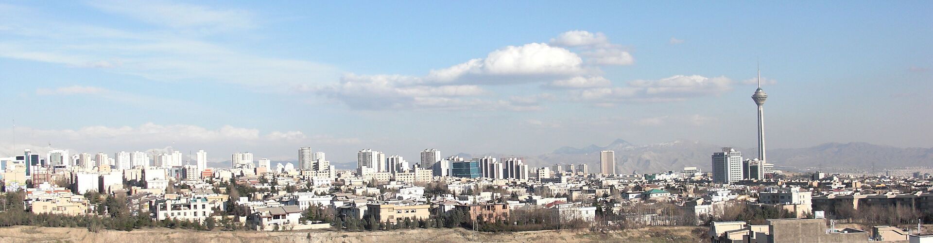 Tehran skyline in winter with Milad Tower visible on the right — the Iranian capital where Field Marshal Munir arrived on April 15, 2026, carrying a US ceasefire framework with seven days until the Islamabad Accord expires