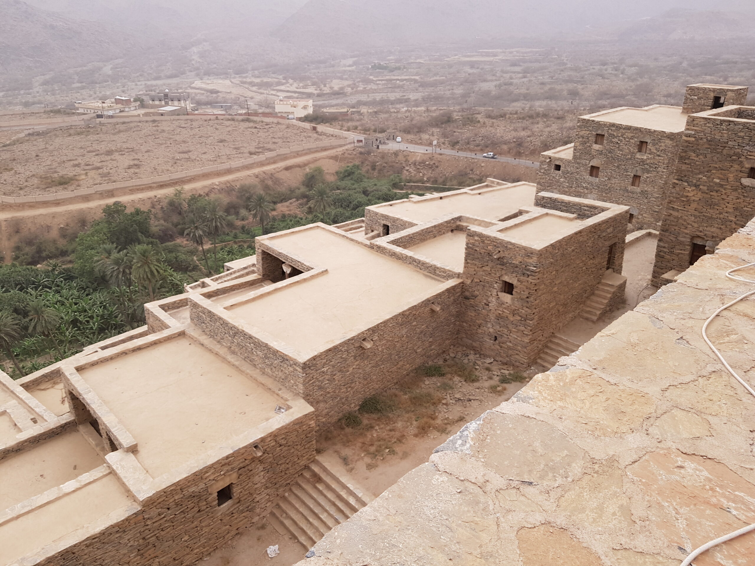 Panoramic view from the rooftops of Thee Ain looking out over the valley and surrounding mountains