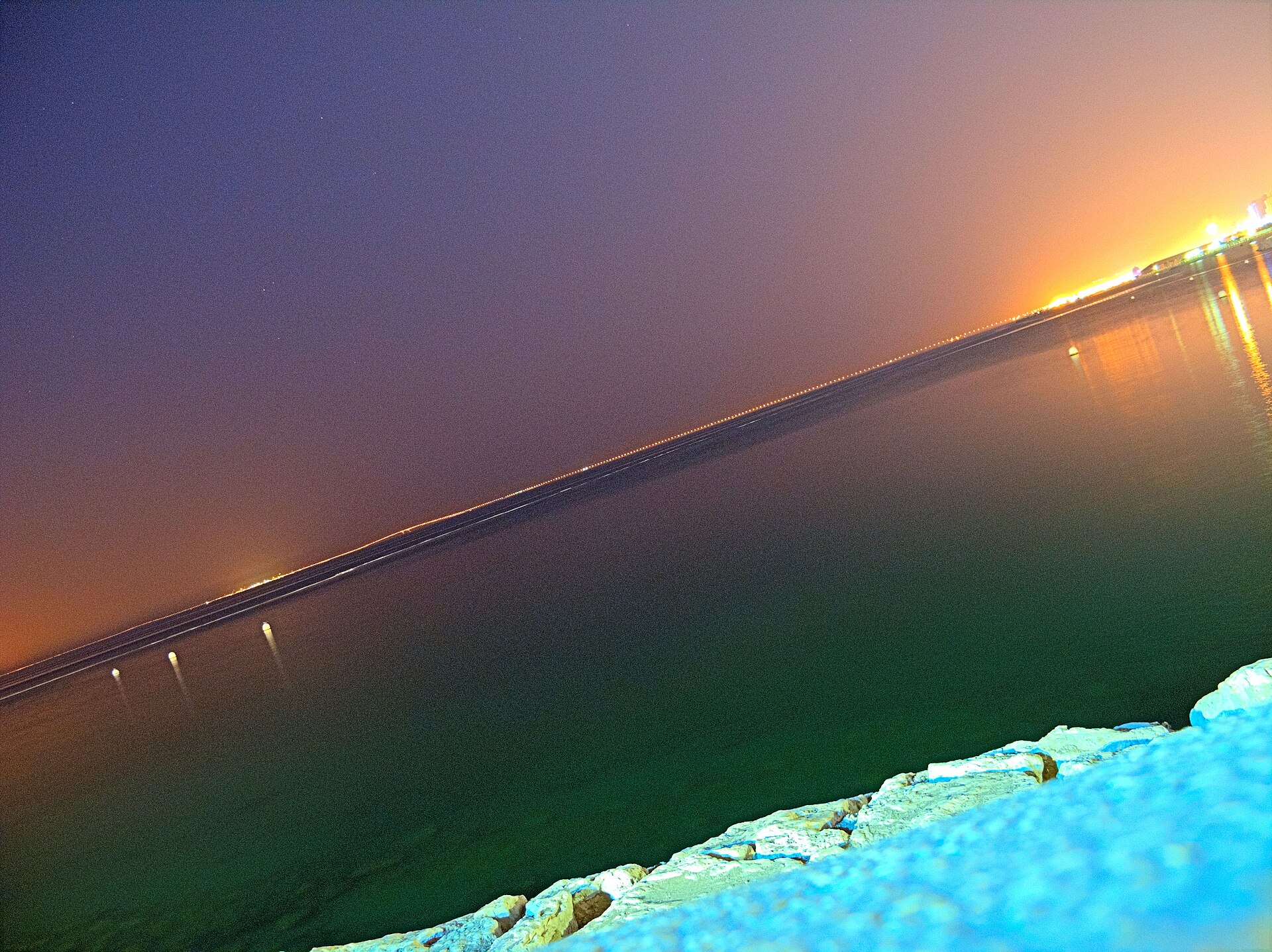 King Fahd Causeway illuminated at night, stretching across the Arabian Gulf between Saudi Arabia and Bahrain