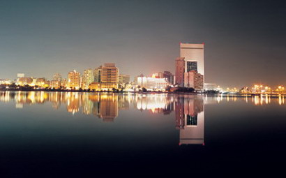 Jeddah waterfront skyline reflected in the Red Sea at night