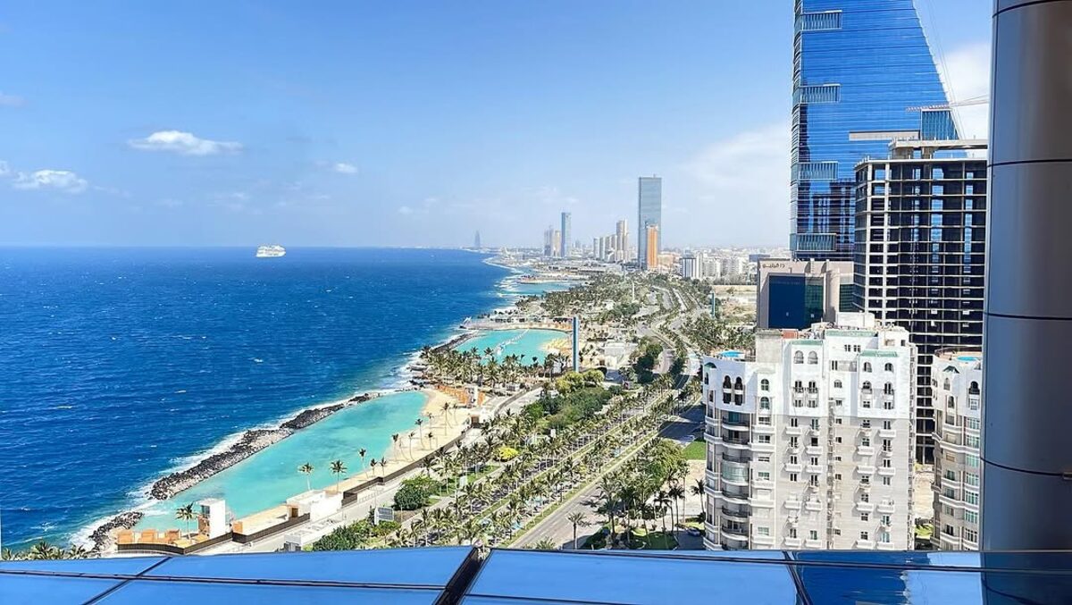 Aerial view of Jeddah's Corniche waterfront with luxury hotel towers along the Red Sea coast