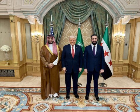 MBS, Trump, and Ahmad al-Sharaa at the Saudi royal palace during Trump state visit, May 2025, with American and new Syrian flags visible