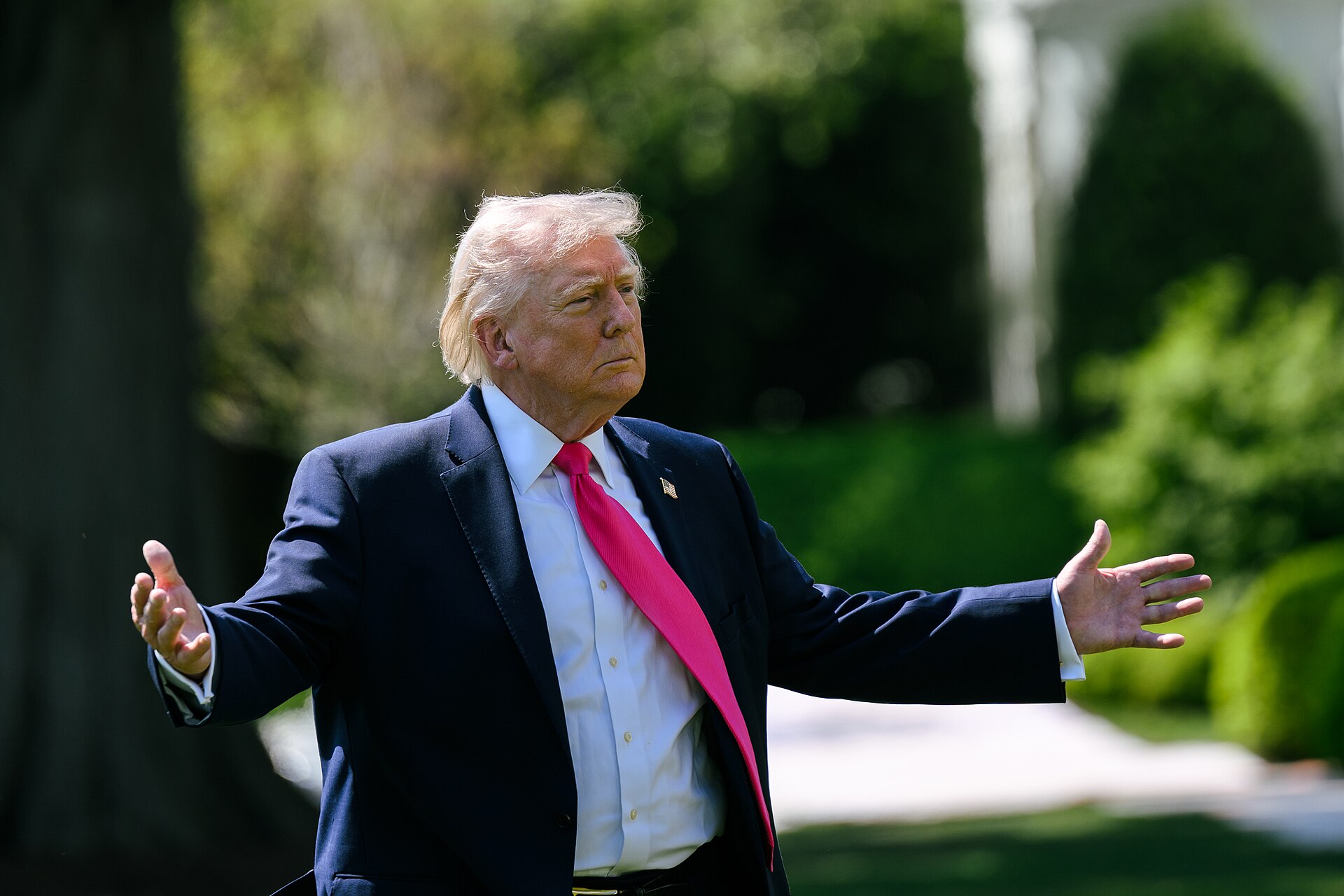 President Donald Trump speaks with reporters on South Lawn of White House before boarding Marine One, April 16 2026