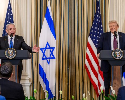 Netanyahu speaks at joint press conference with Trump at the White House, September 2025, with Israeli and US flags flanking the podiums
