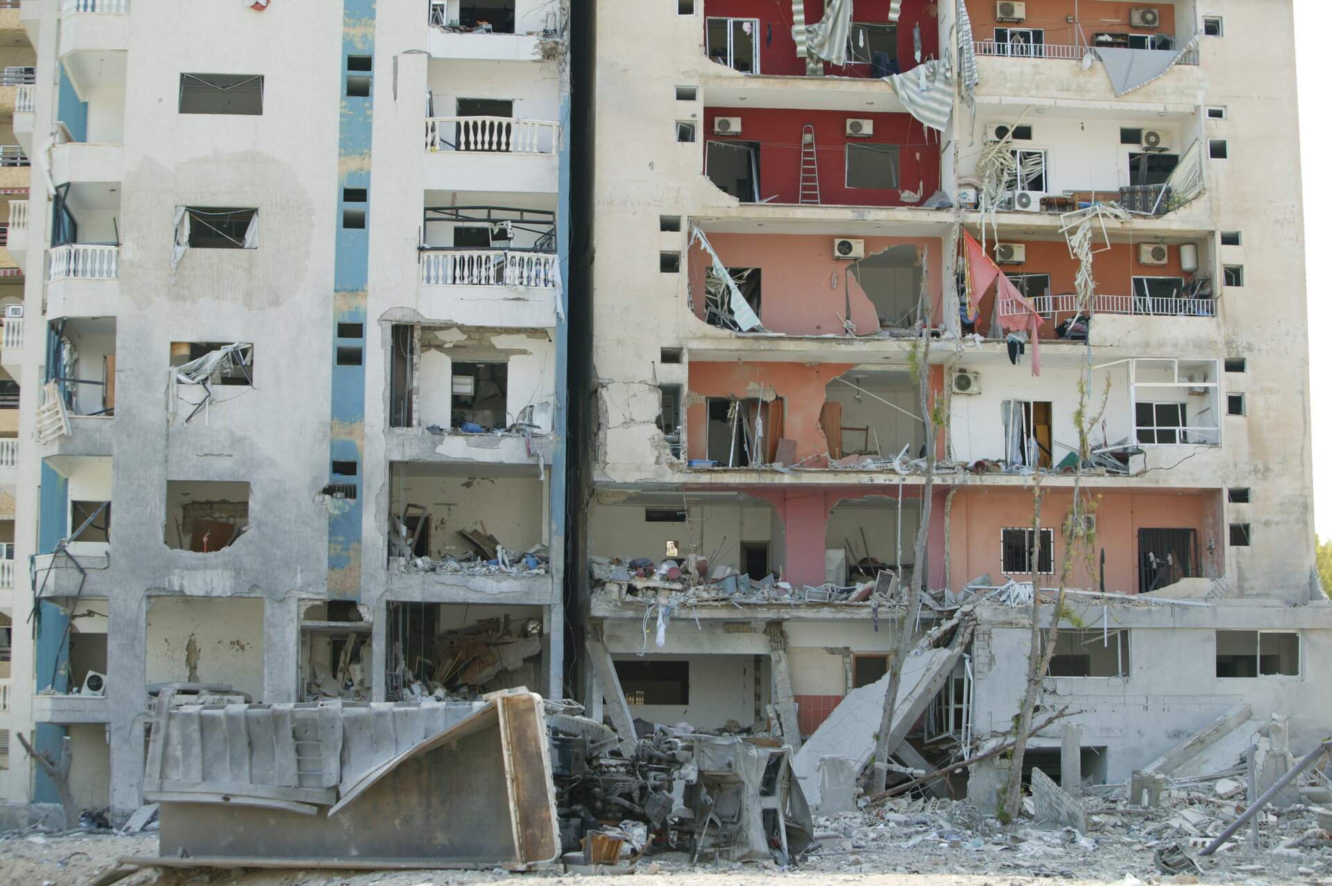 Destroyed apartment buildings in Tyre, Lebanon after the 2006 war — within months of the ceasefire, Iran had begun resupplying Hezbollah, which rebuilt from 4,000 rockets in 2006 to an estimated 150,000 by 2023