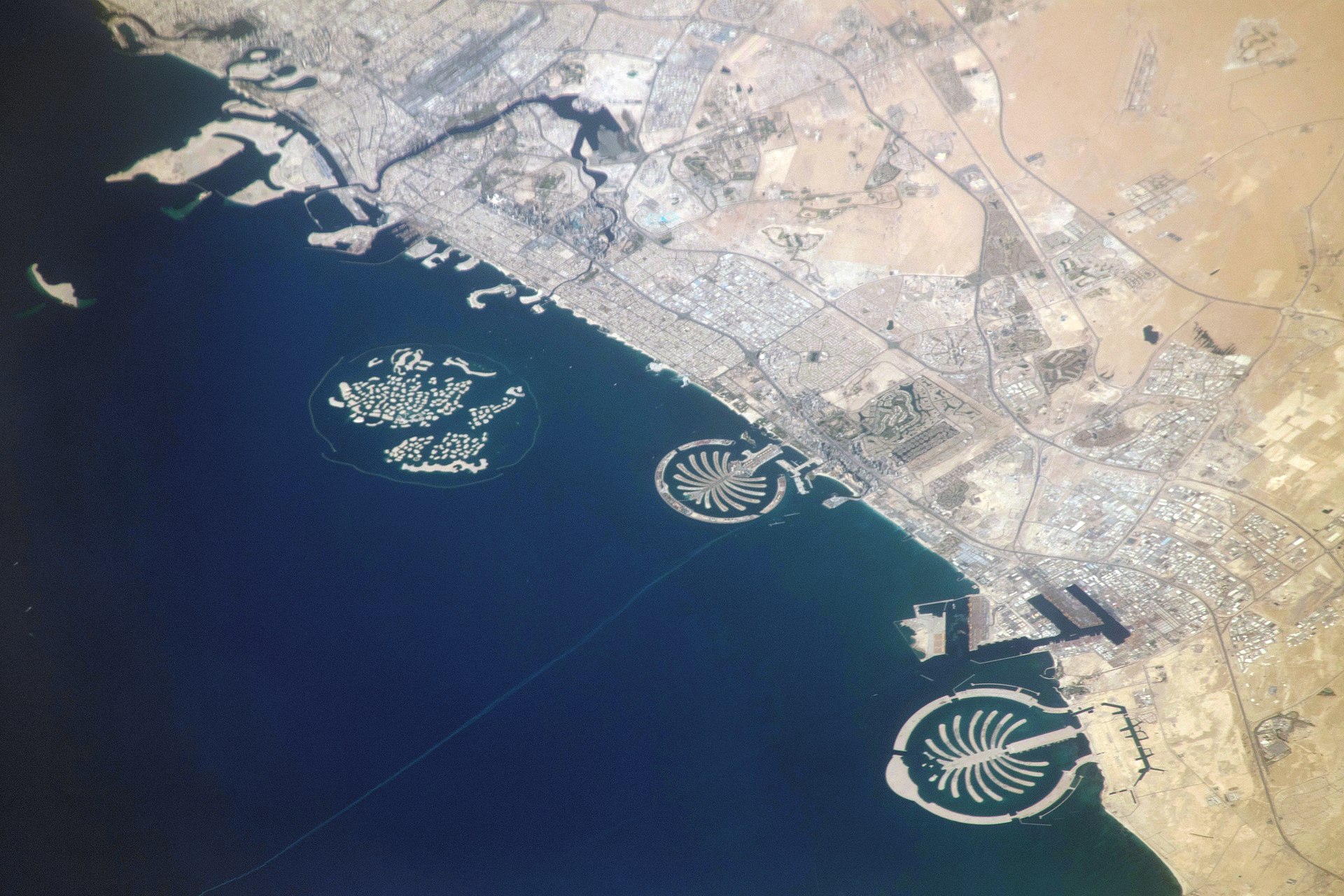 UAE coastline from the International Space Station showing Dubai, Palm Jumeirah, Jebel Ali port and free trade zones, Persian Gulf, NASA public domain