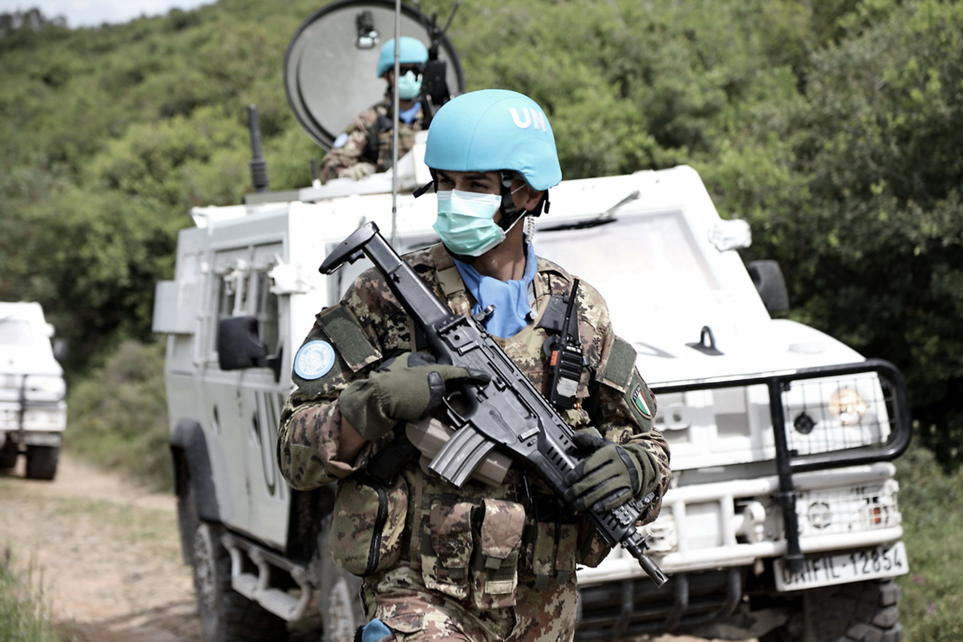 Italian Army UNIFIL soldier and armored vehicle on patrol along the Blue Line in southern Lebanon, May 2020