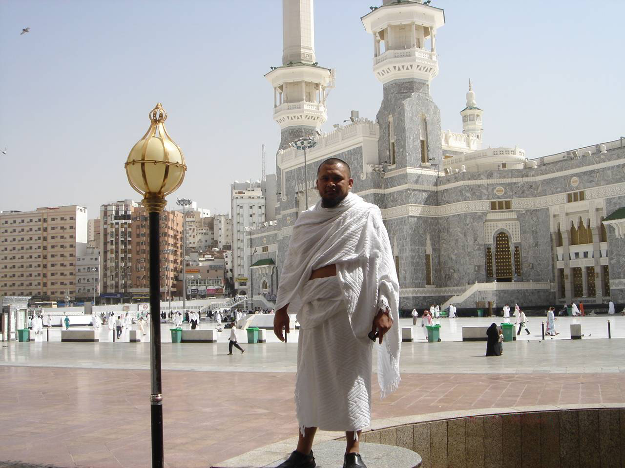 A male pilgrim wearing ihram garments at Masjid al-Haram in Makkah