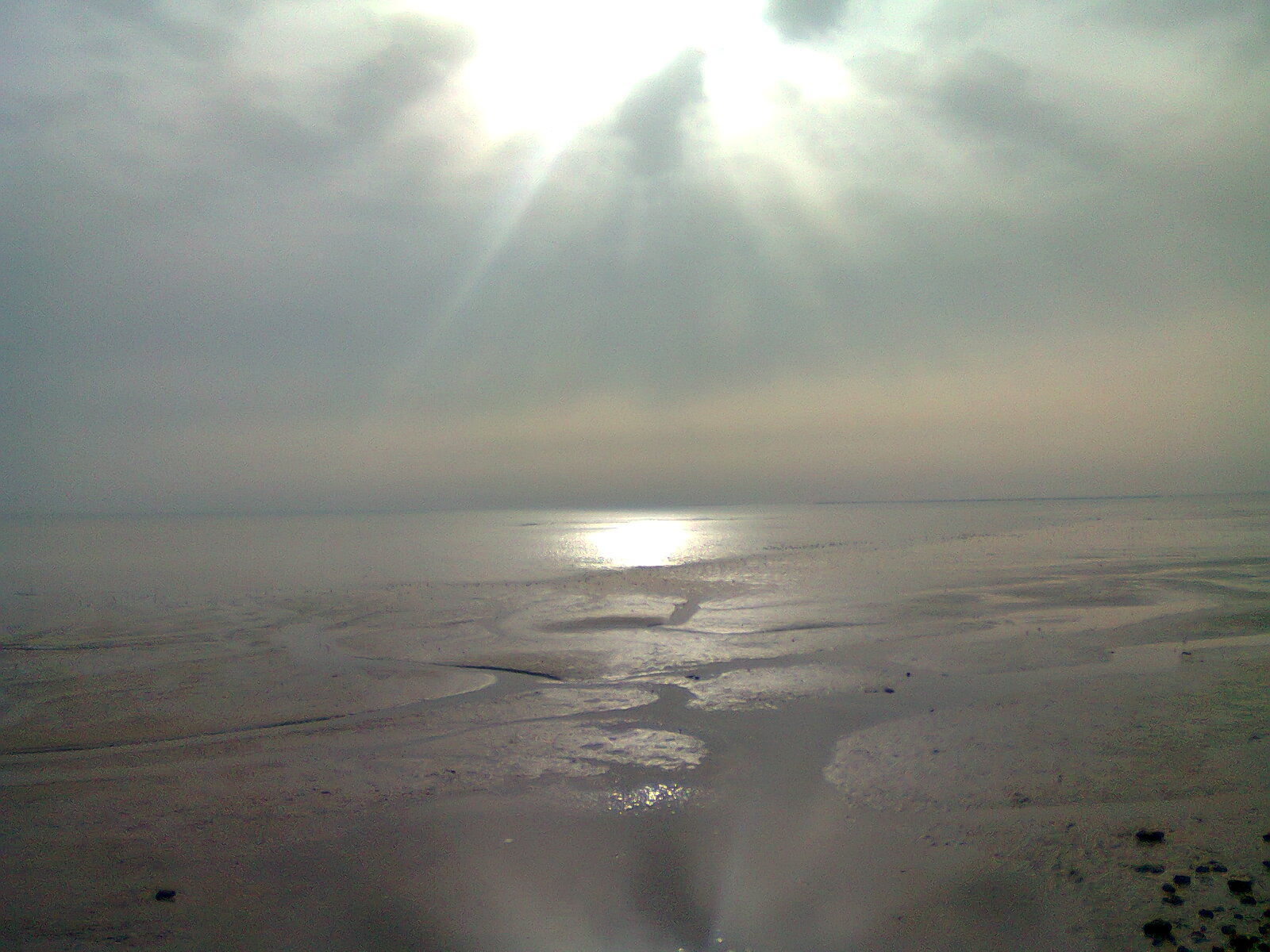 The Persian Gulf shoreline at Half Moon Bay near Al Khobar, Eastern Province of Saudi Arabia, looking across the Arabian Gulf at dawn